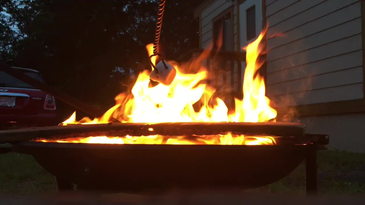 Great Guy Makes Campfire Smores for his Sweety