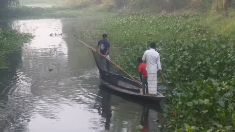 Net fishing with boat in a villae.