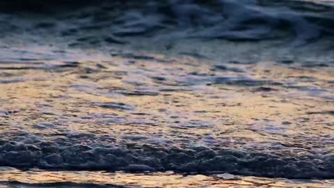 Small waves under a setting sun