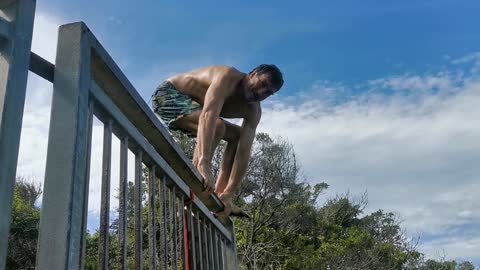 Couple jumps off the bars