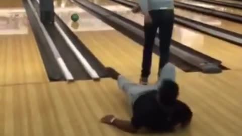 Guy wants to kick bowling guy fails