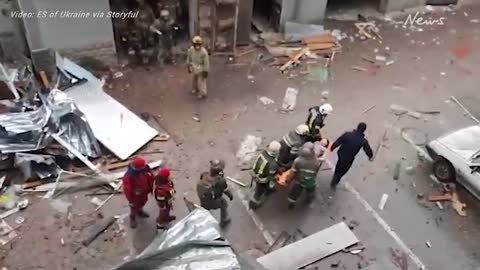 Firefighters rescue person from rubble in Kharkiv