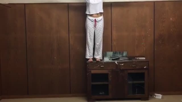 Girl doing flip and lands on her back