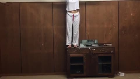 Girl doing flip and lands on her back