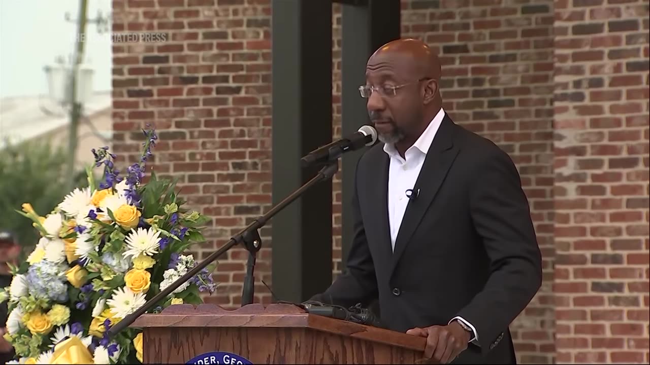 Senator Raphael Warnock speaks at Georgia vigil mourning victims of mass school shooting