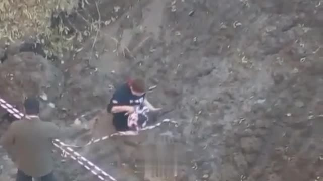 The child got stuck in a mud pit