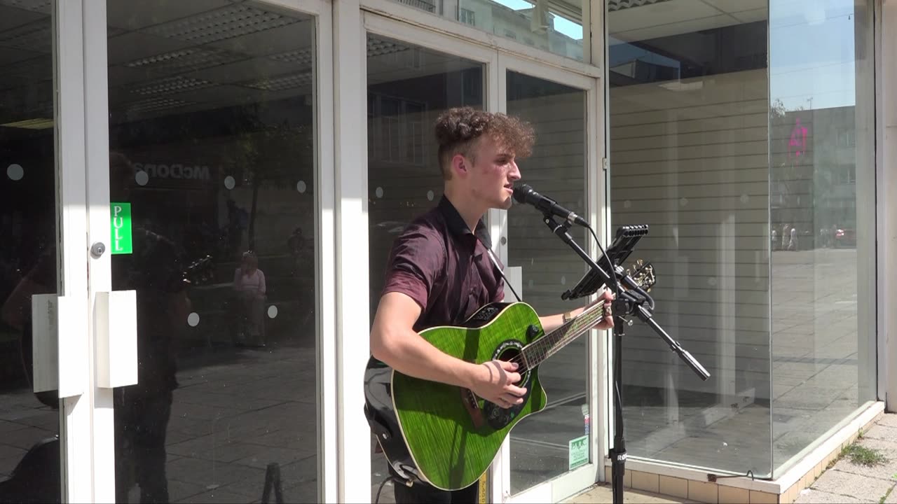 Ile riding shotgun. Aron James Busking the Ocean City Plymouth 12th August 2020