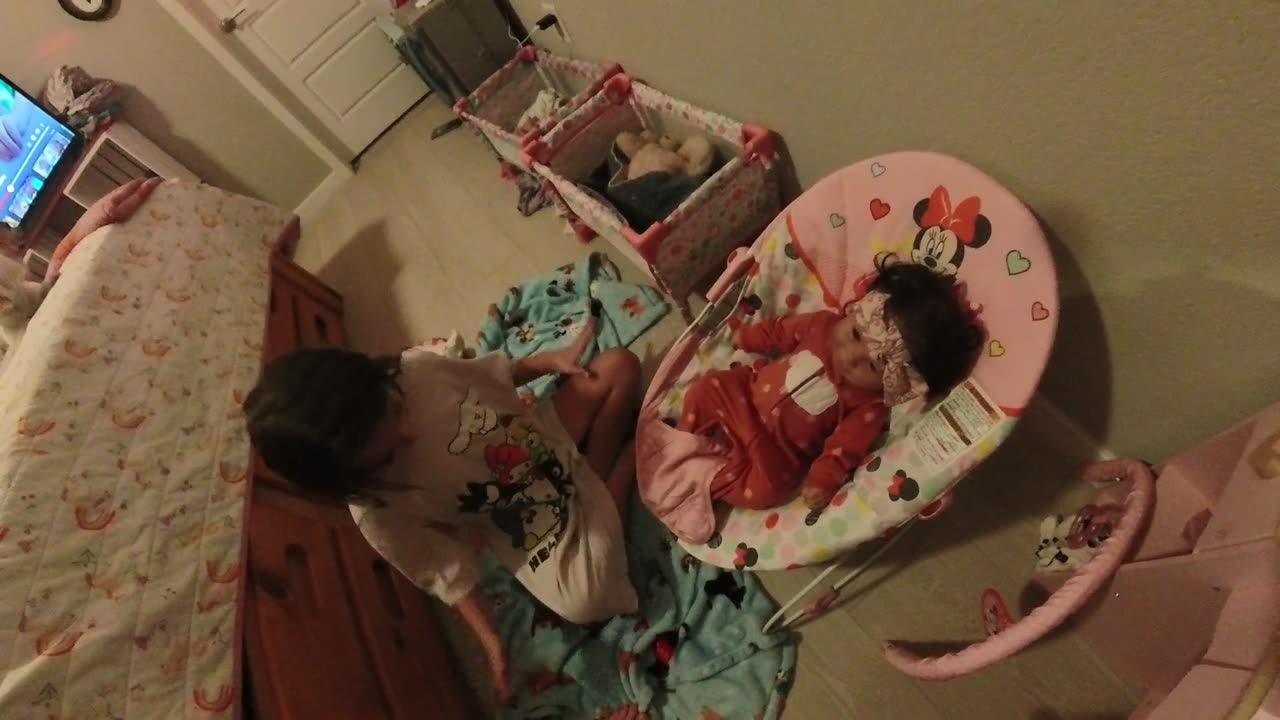 After a long day Paris preps the babies for bed.