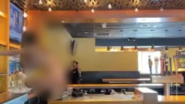 Naked woman destroys two restaurants, gets tased by police