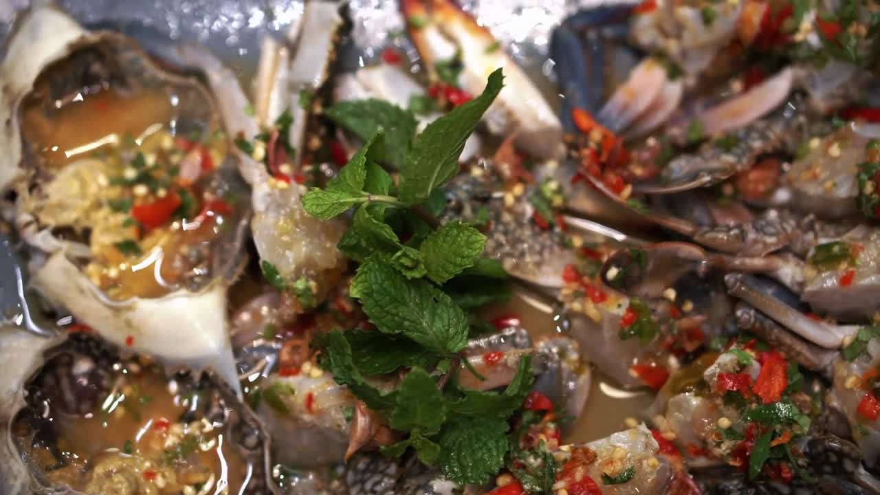 Raw pickle blue crab spicy sauce Thai seafood plate