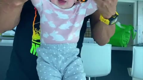 Father teaching son how to dance