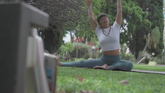 Girl recording online yoga classes