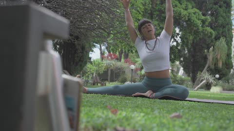 Girl recording online yoga classes