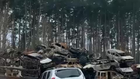 Cemetery of burnt and unrepairable cars