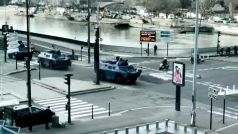 Armoured vehicles arrive in Paris amid the French convoy for freedom