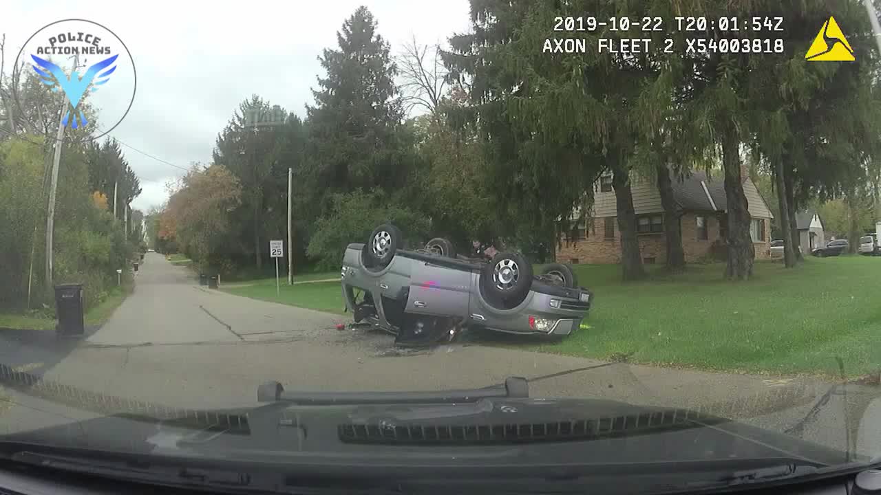 Police Dashcam Captures Rollover Crash During Chase