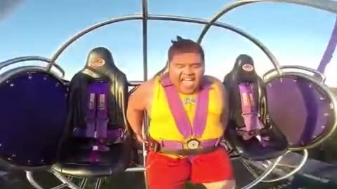 Big Man Freaks Out On Slingshot Ride