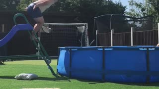 Dad Plops Short of Pool