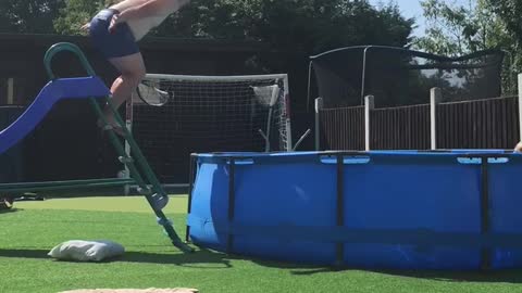 Dad Plops Short of Pool