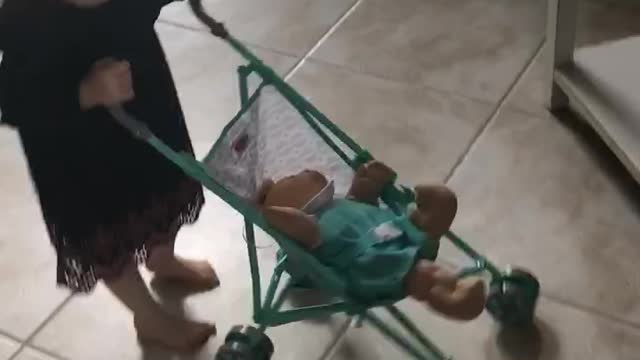Her baby got a stroller!
