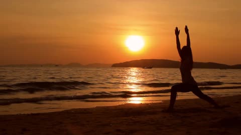 Yoga on Beach Sunset by a Beautiful Girl