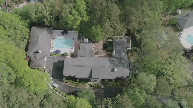 Aerial View Of A Luxurious House With Pool
