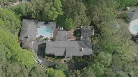 Aerial View Of A Luxurious House With Pool