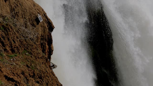 A Footage of a Waterfall Cascading