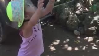 Lisa gets a delicious fruit season. Little girl farmer