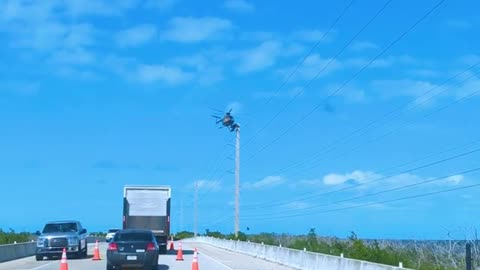 WATCH : Worker Balance On Helicopter! 😲