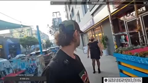 Dude in a dress losing it.