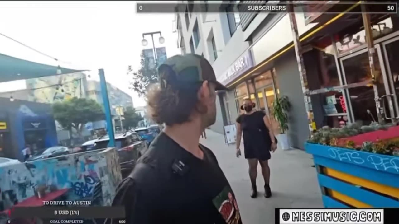 Dude in a dress losing it.