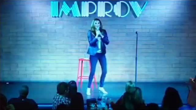 Comedian, Heather McDonald, Collapses on Stage After Telling Joke About Booster Shot