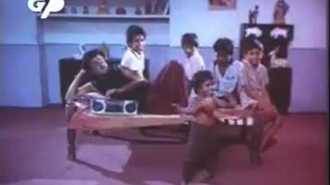 CHILDREN DANCING TO THE RADIO