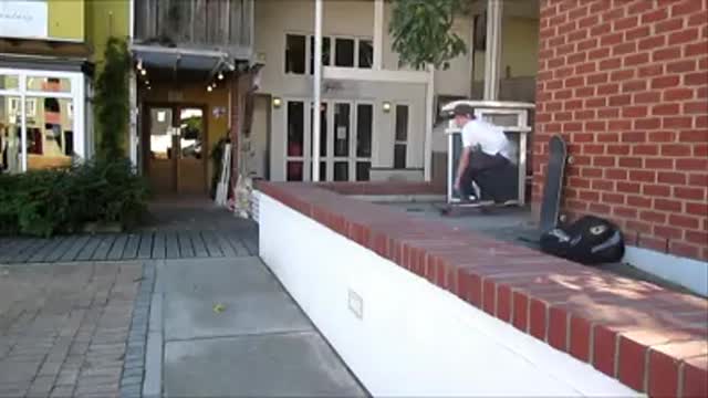 Kid skates off ledge, skateboard jabs him in the behind