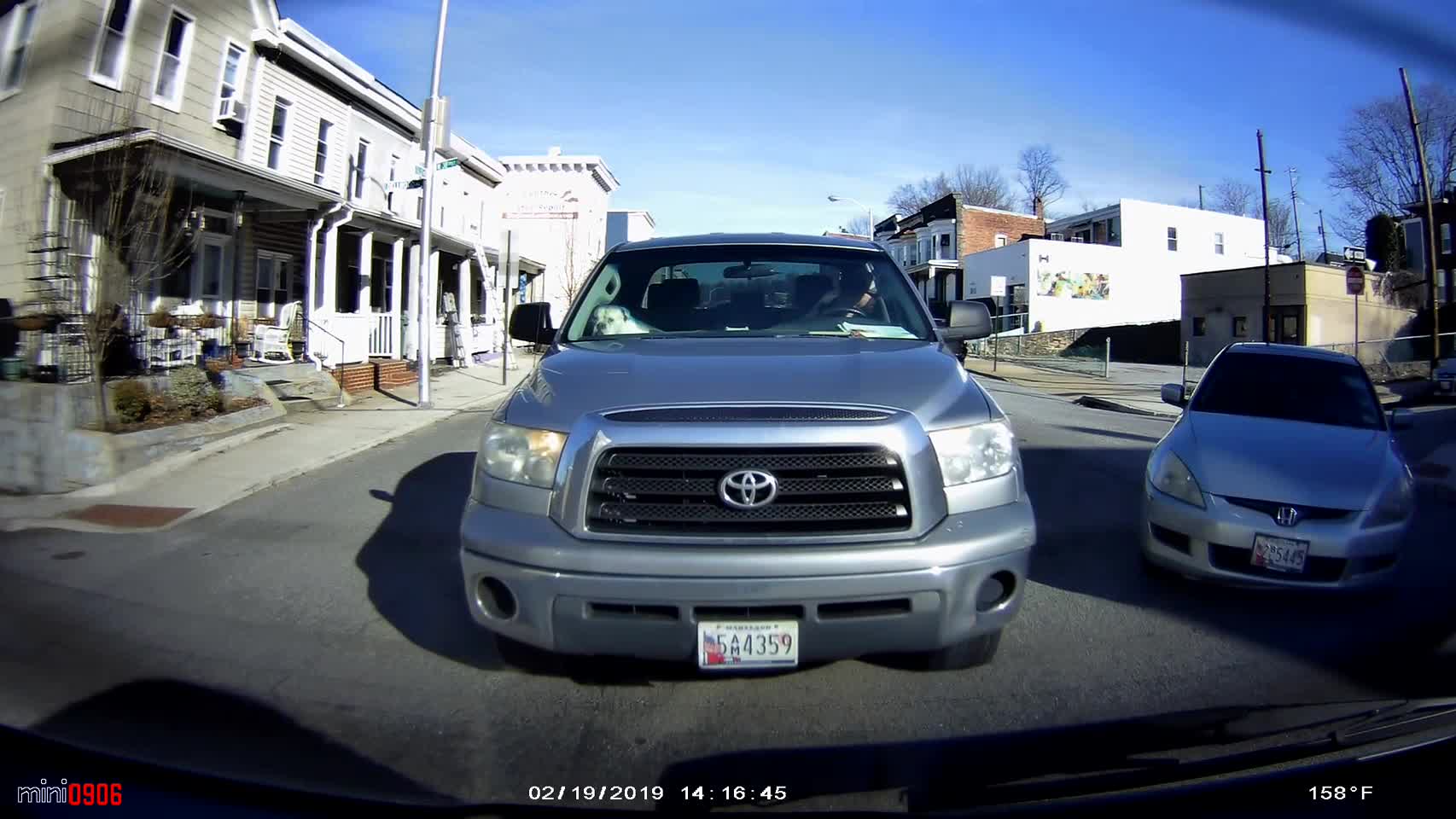 Man Chucks Drink at Car after Driving Incident