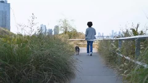 Kid Running with a Dog