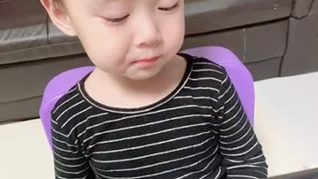 A baby who suddenly fell asleep while eating