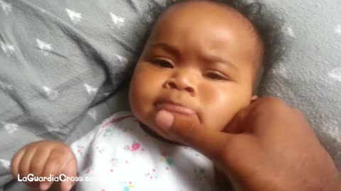 Cute baby beat boxing with father