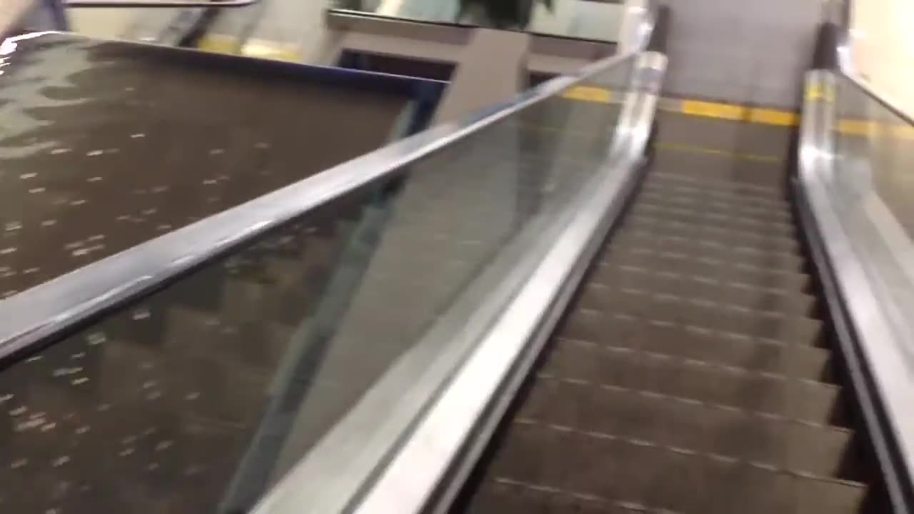 Riding the Airport Escalator