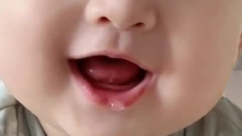 "The Irresistible Charm of a Cute Baby Smile"