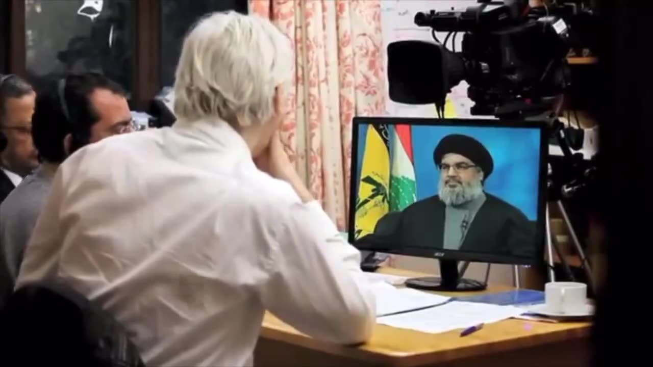 Assange first interview since being released with Hezbollah leader Sayyid Hasan Nasrallah