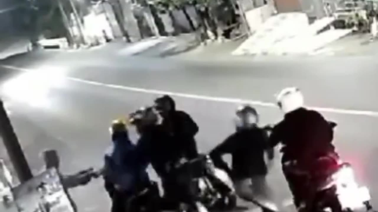 Motorbike robbers on the side of the road In Indonesia