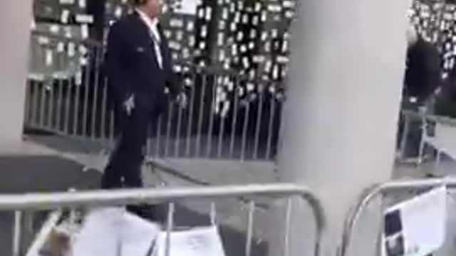 Stickers of the dead caused by the jabs are posted on windows of the BBC