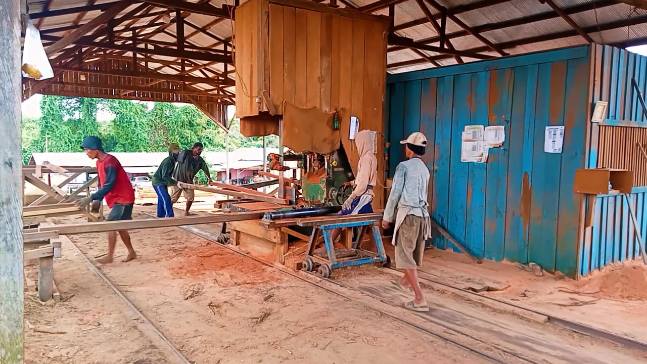 The Process Of Making Dark Red Meranti Wooden Boards And Others
