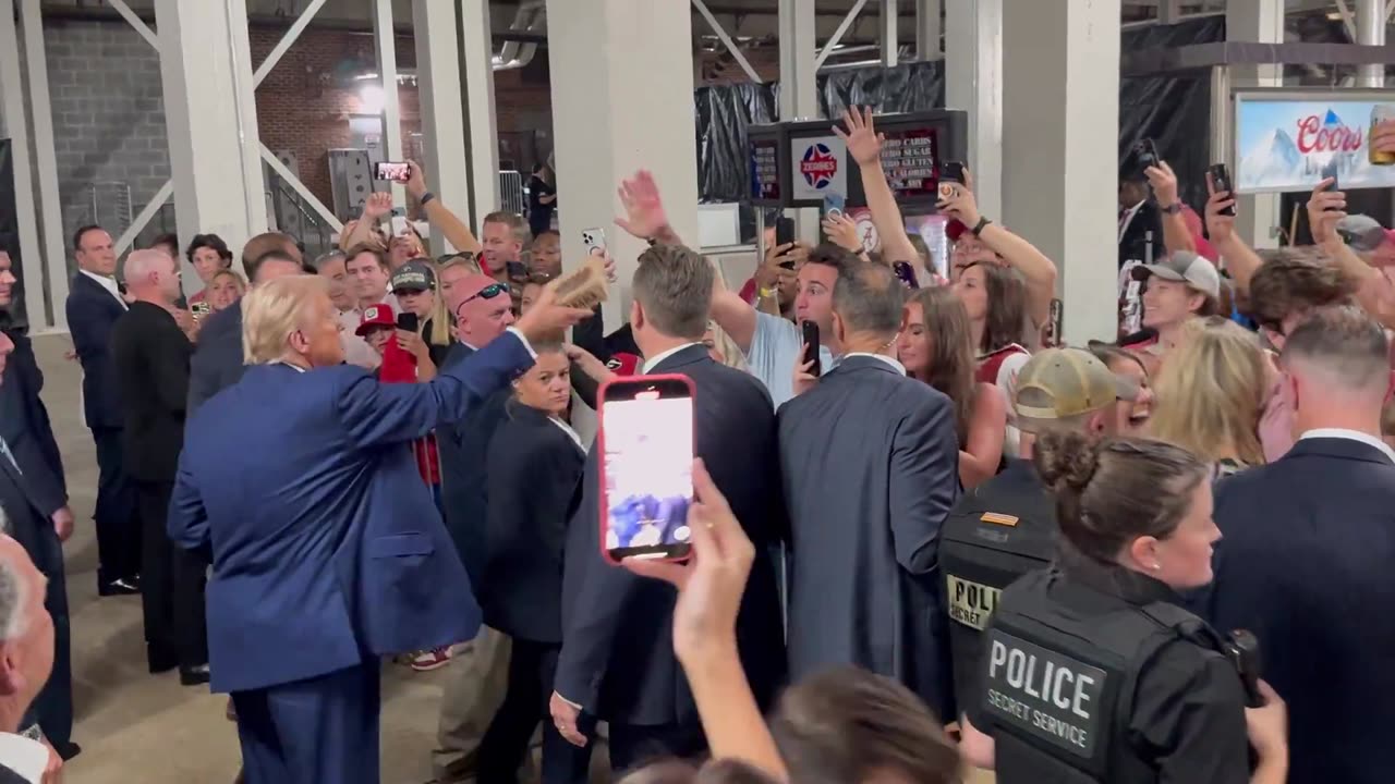 President Trump Giving Away Popcorn and other snacks at Bryant-Denny Stadium in Tuscaloosa