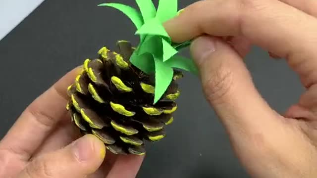 Make pineapple from pinecones