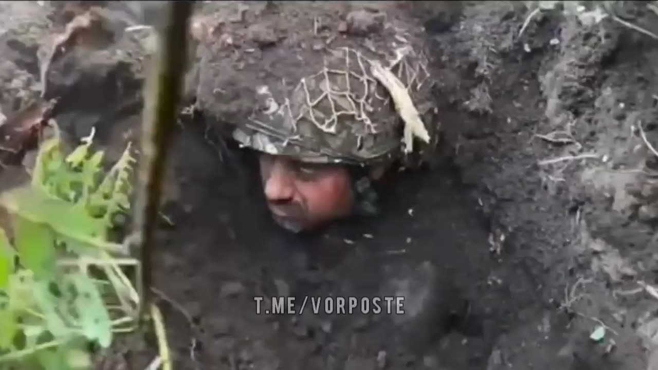 Ukrainian Soldier Buried In Dirt From Artillery