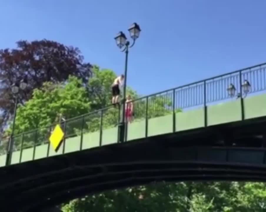 Guy Flops Into A River Doing A Backflip Off A Bridge