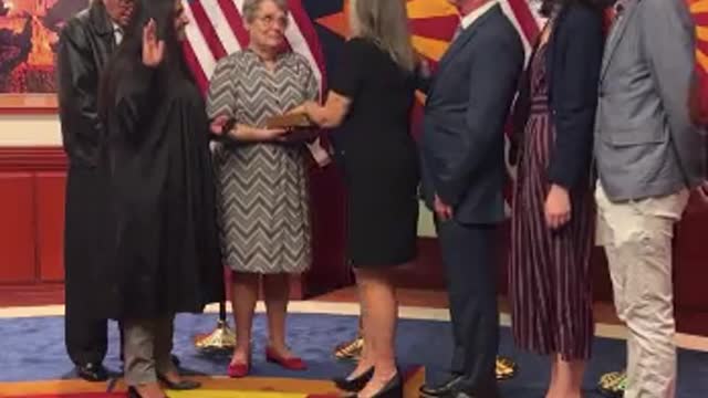 Katie Hobbs Unable to Take the Oath of Office Without Stammering and Laughing Through It